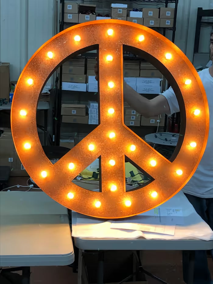 Rust-finish marquee arrow symbol